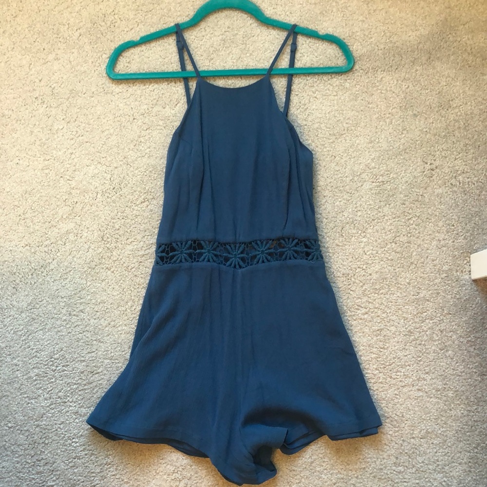 Blue romper from Nikkis beach house boutique